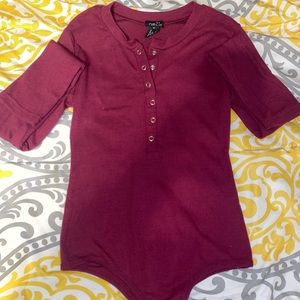 Burgundy long sleeve button bodysuit